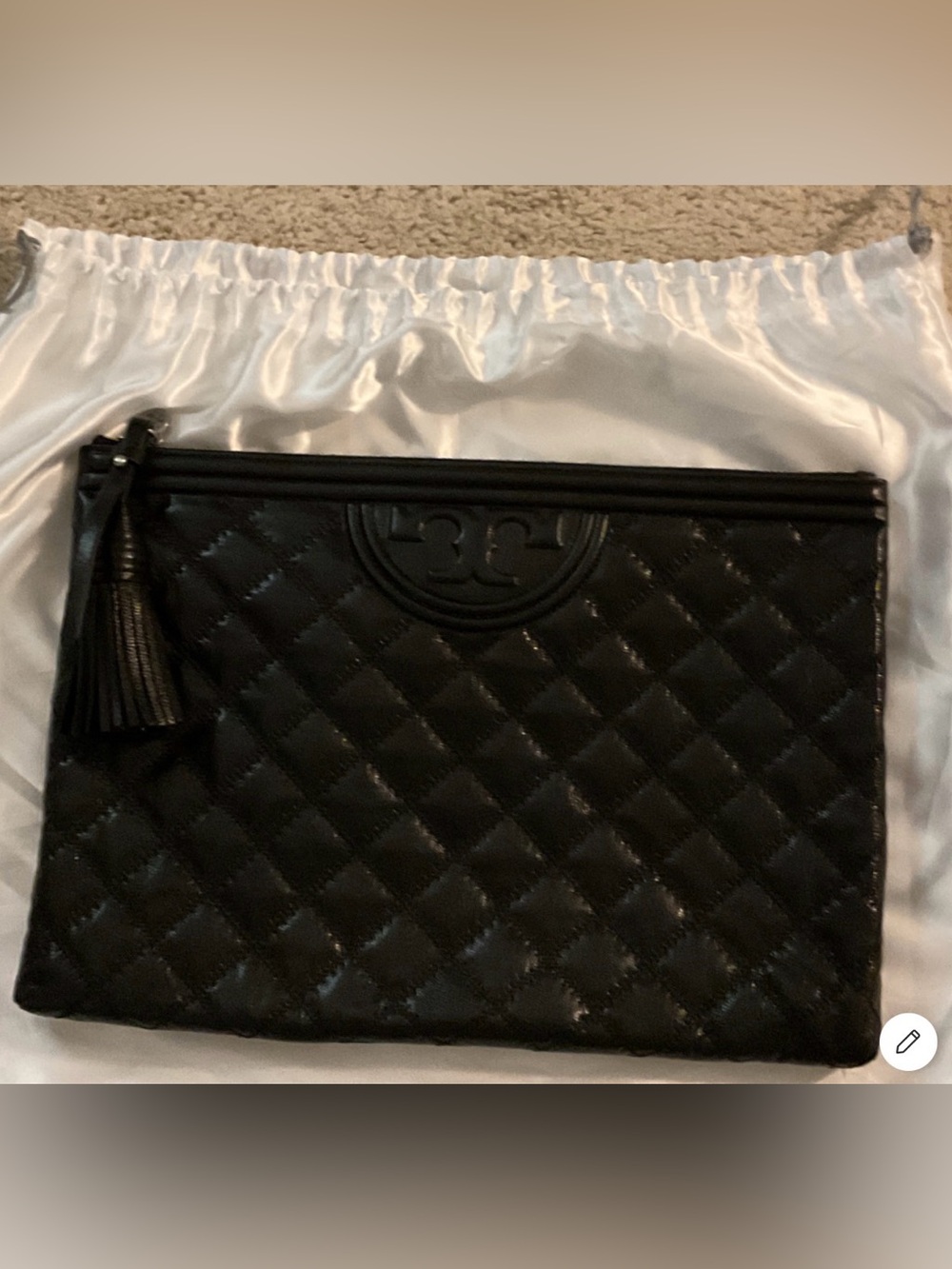 Tory Burch Fleming Black Quilted Leather clutch with  tassel